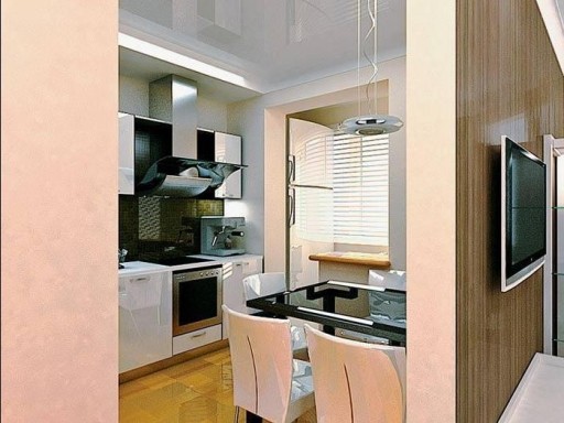 In the niche formed after the unification of the kitchen and balcony, ideally placed a large refrigerator