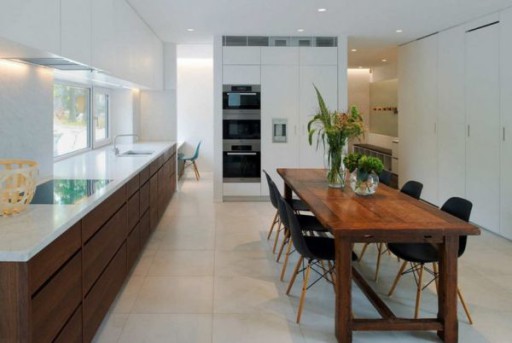 The functional spacious kitchen benefits from a stylish dining area