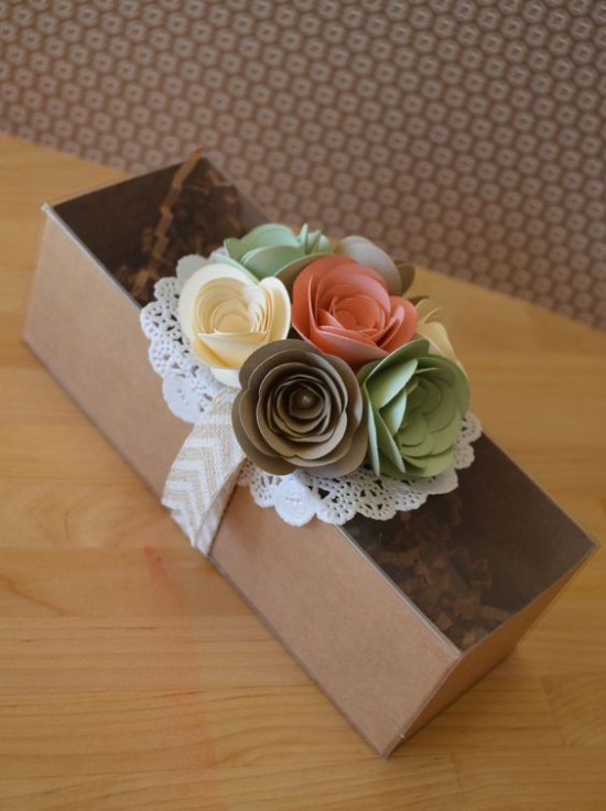 Packing gifts with flowers from paper