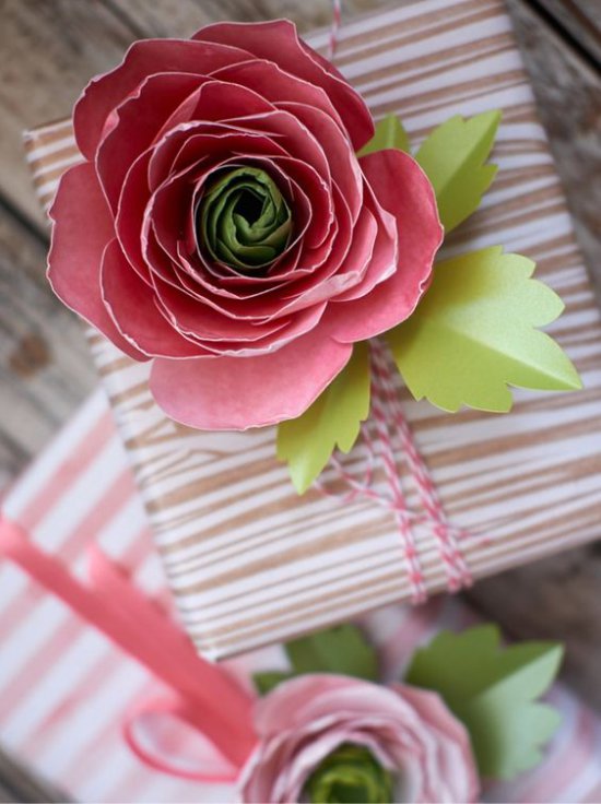 Packing gifts with flowers from paper