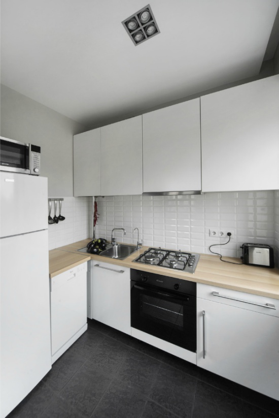 Modern kitchen with tiled floor